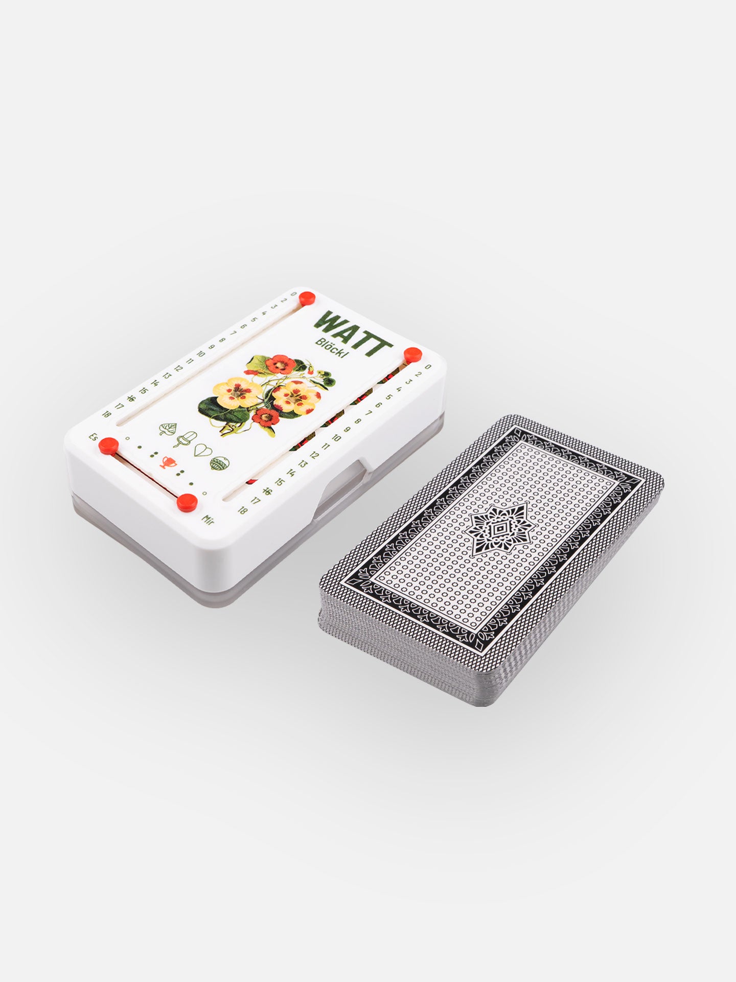 Wattblöckl aus Kunstoff in weiß und roten Pins mit Blütenblatt Motiv und Salzburger Spielkarten.