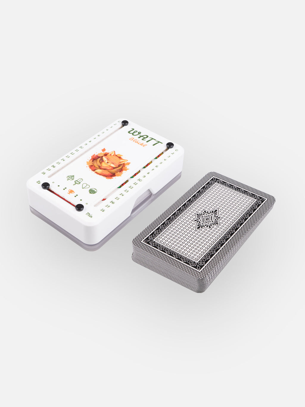 Wattblöckl aus weißem Kunststoff und schwarzen Pins mit Fuchsbau Motiv und Salzburger Spielkarten.