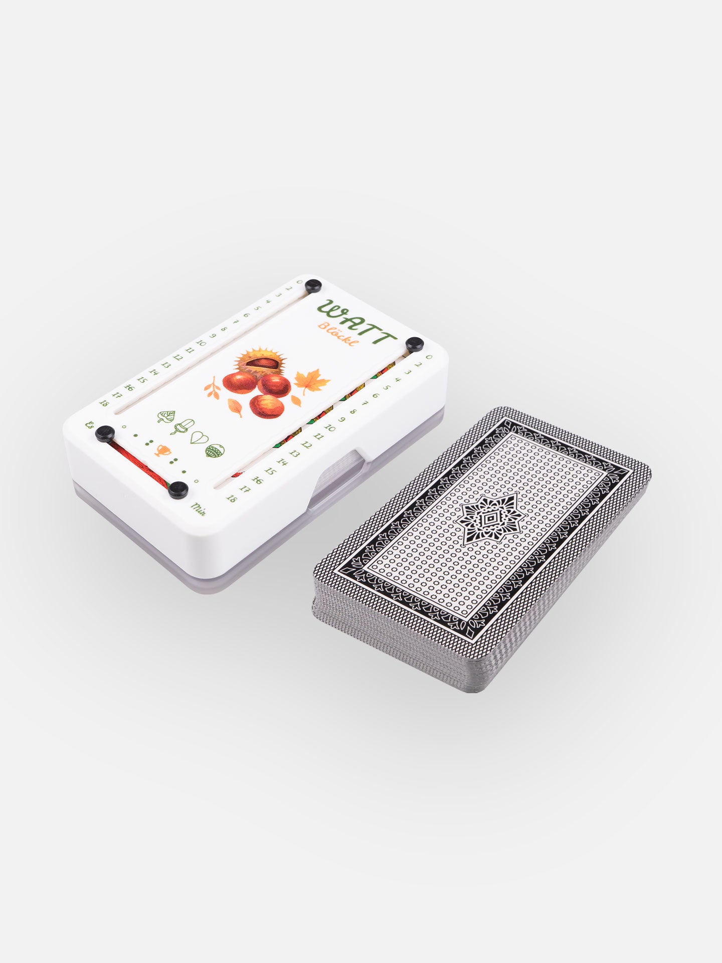Wattblöckl aus weißem Kunststoff und schwarzen Pins mit Keschtenzeit Motiv und Salzburger Spielkarten.