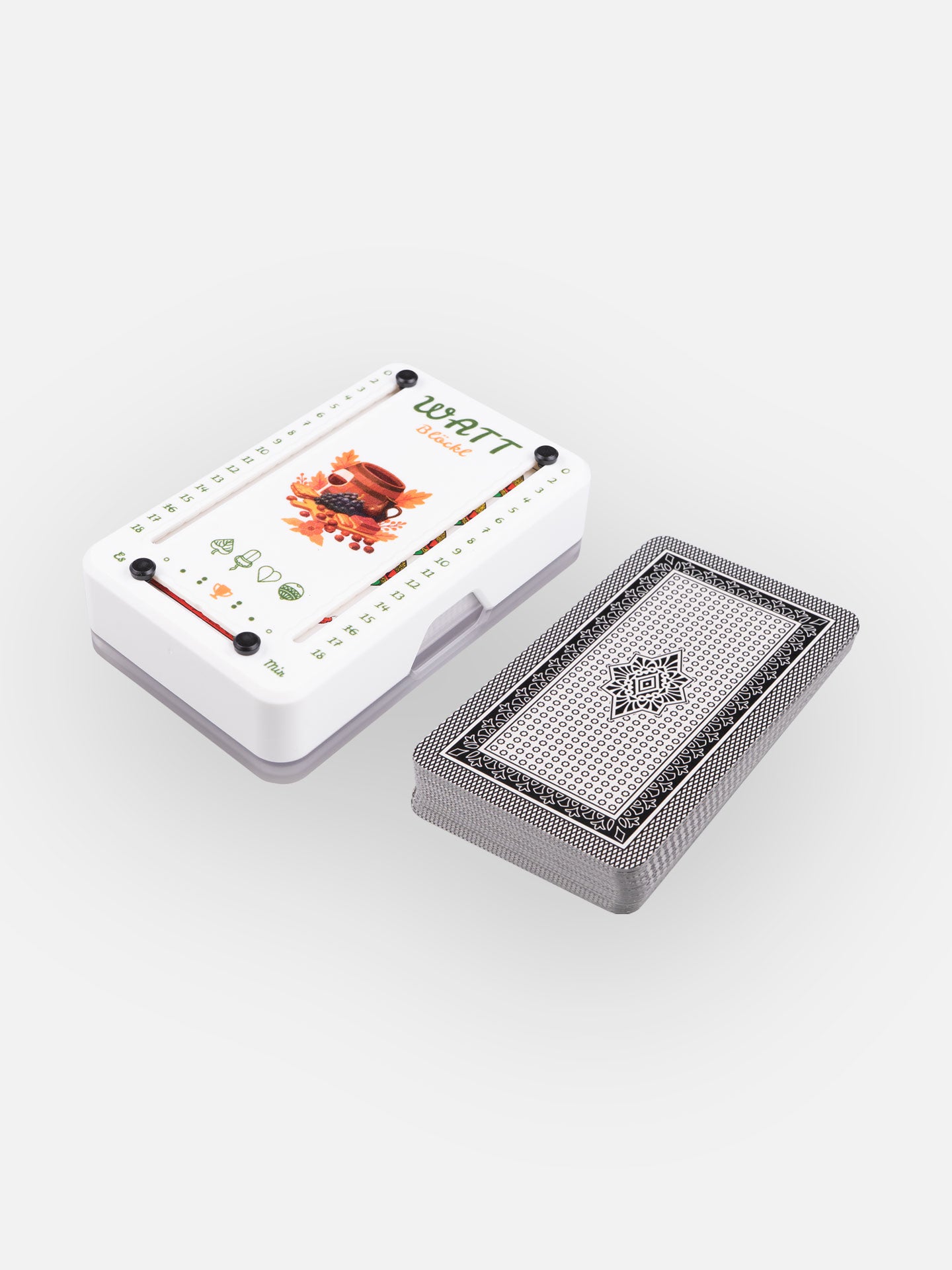 Wattblöckl aus weißem Kunststoff und schwarzen Pins mit Törggelen Motiv und Salzburger Spielkarten.